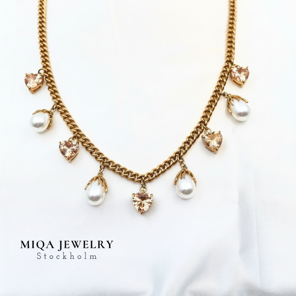 Pearl heart charm necklace