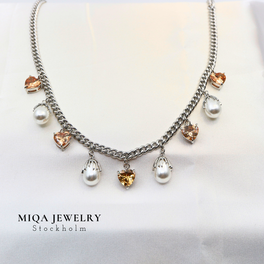 Pearl heart charm necklace