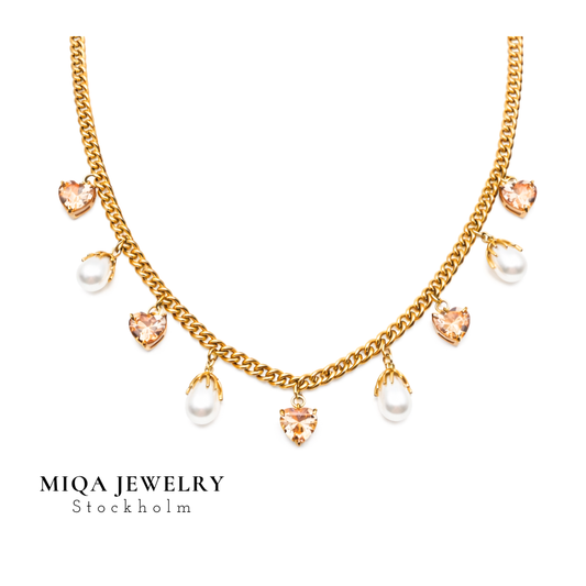 Pearl heart charm necklace