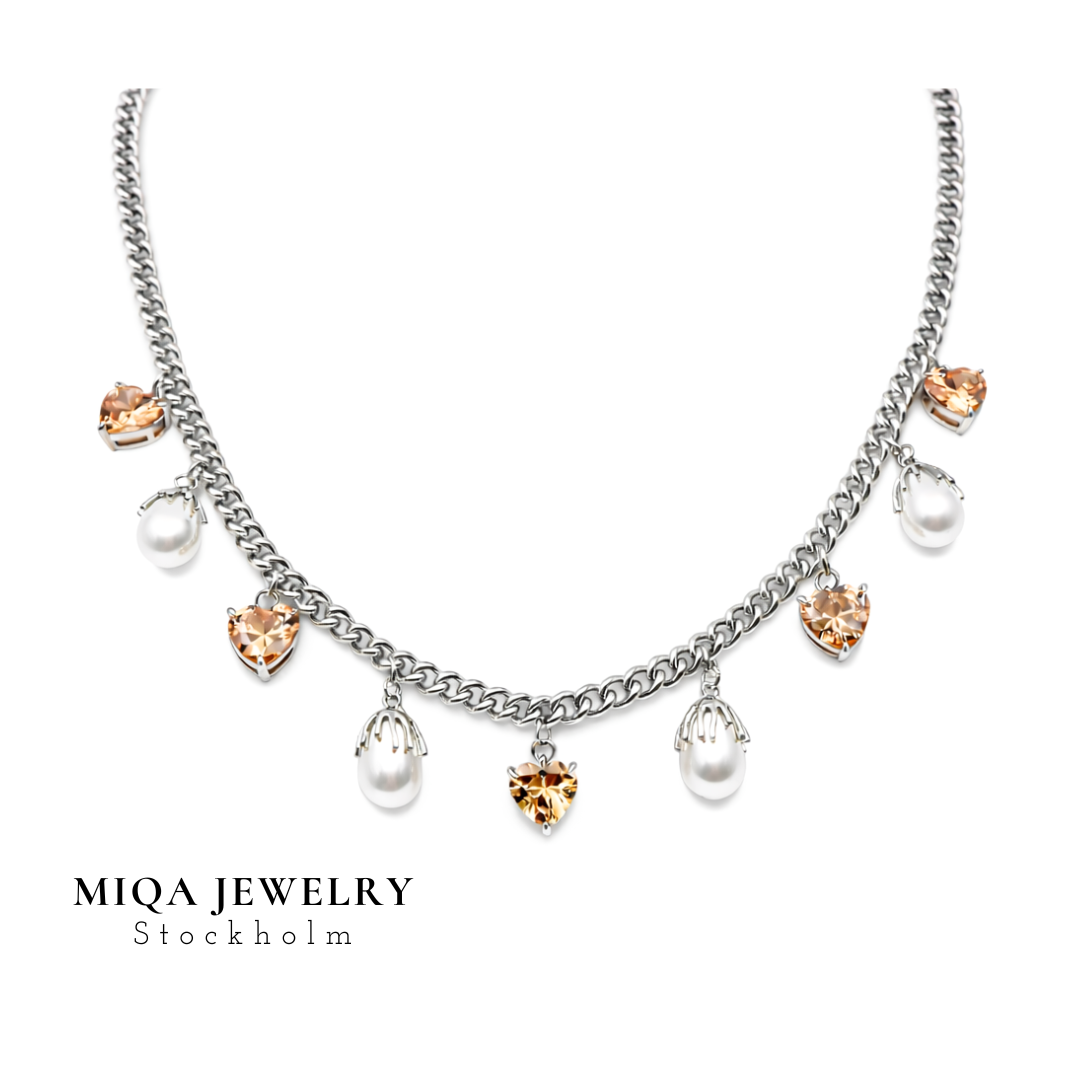 Pearl heart charm necklace