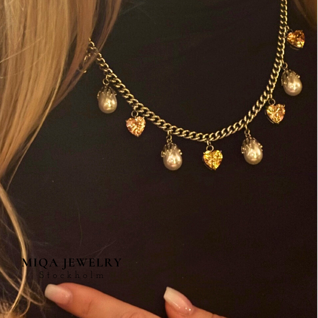 Pearl heart charm necklace