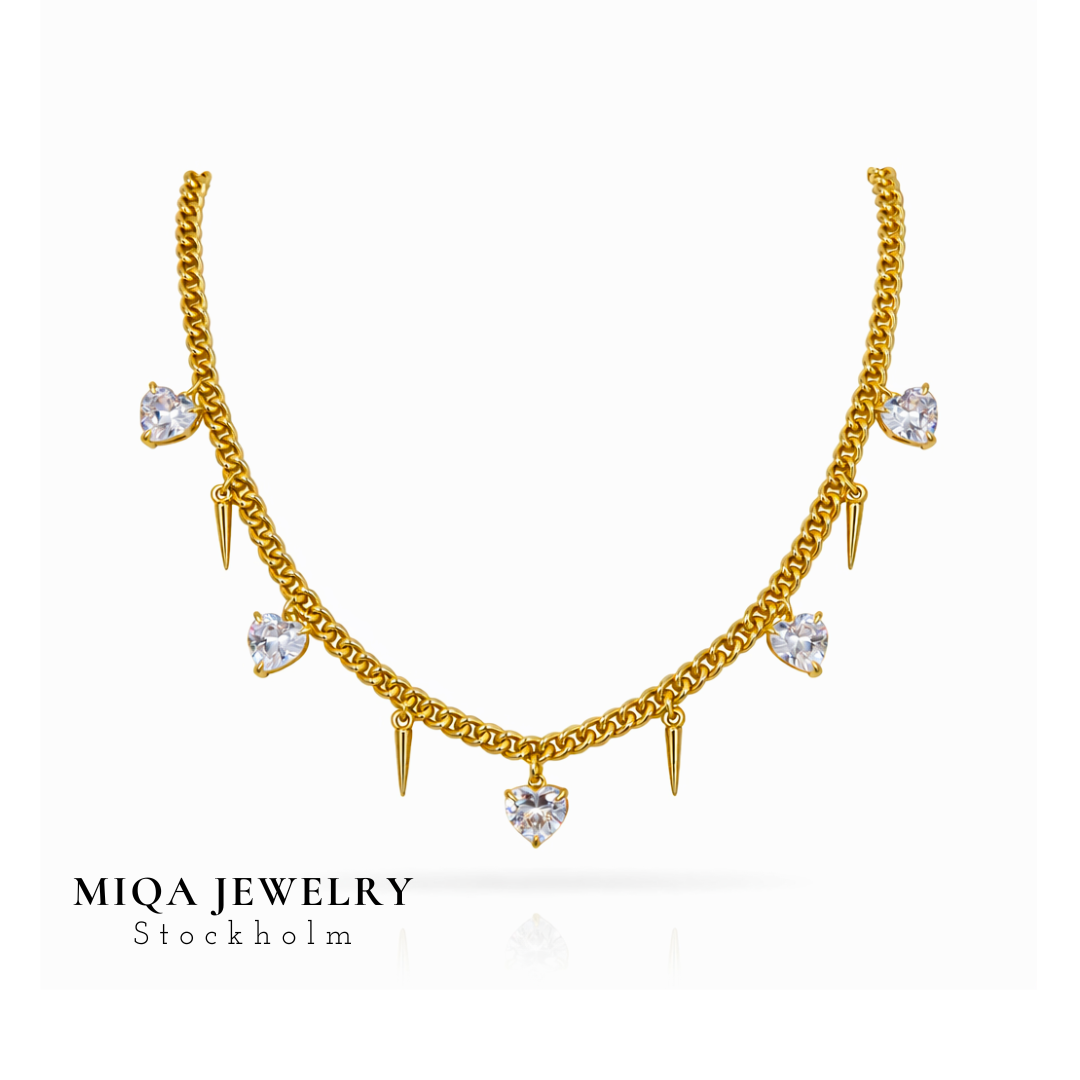 Spike heart charm necklace