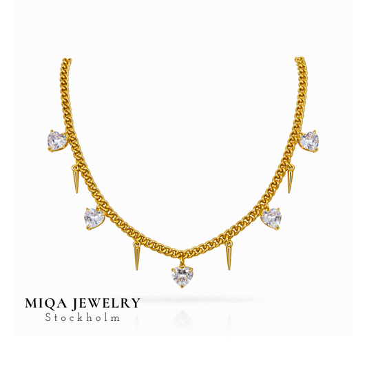 Spike heart charm necklace