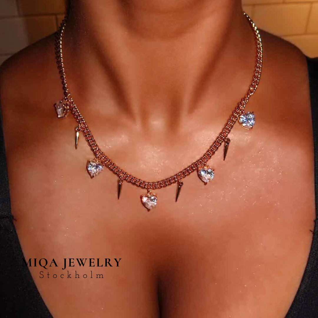 Spike heart charm necklace
